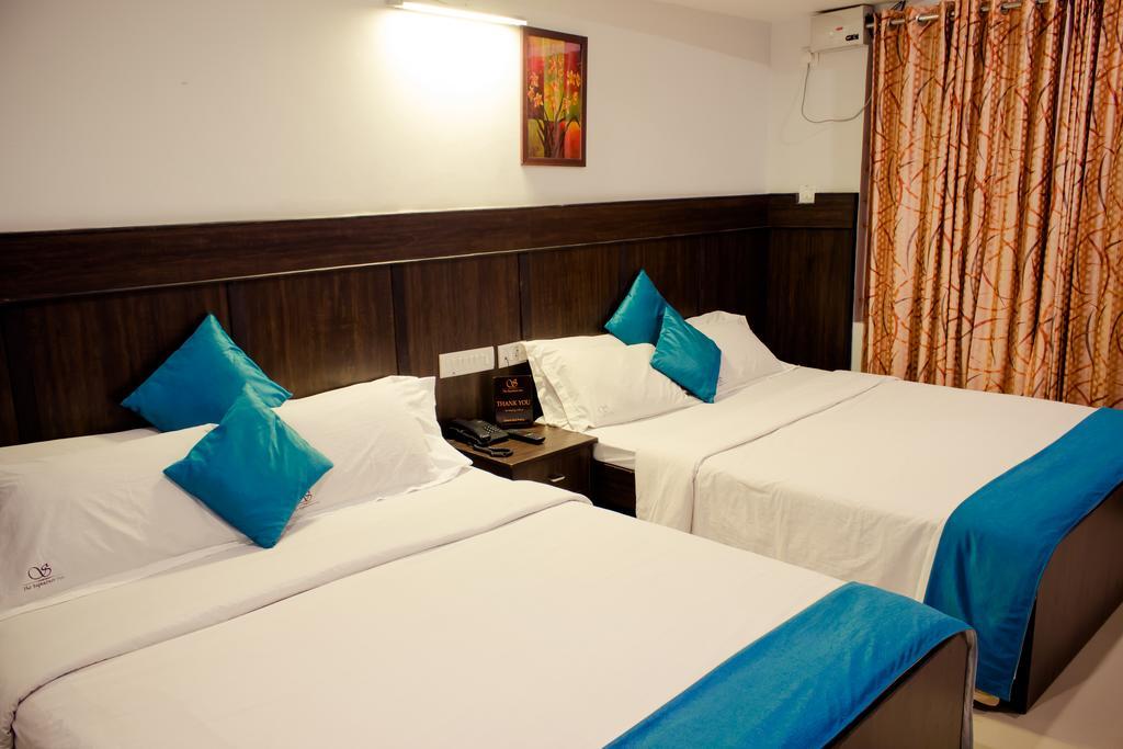 The Signature Inn Бангалор Номер фото