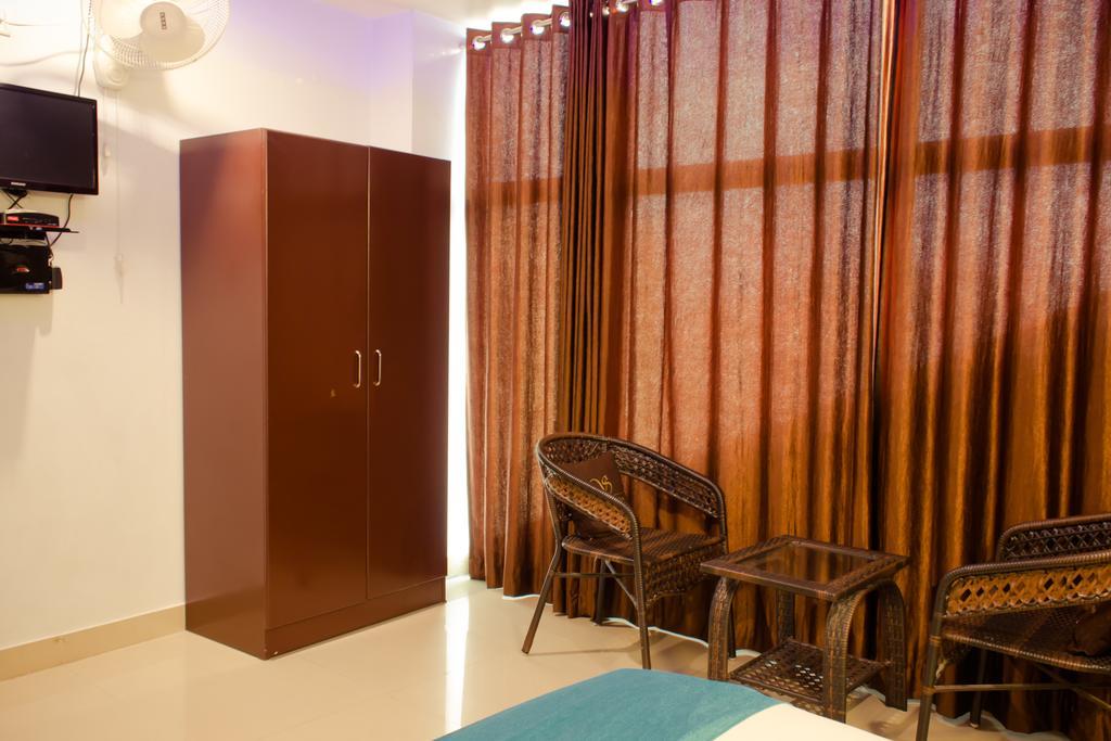 The Signature Inn Бангалор Номер фото